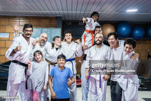 portrait of karate students during a karate class - jujitsu stock pictures, royalty-free photos & images