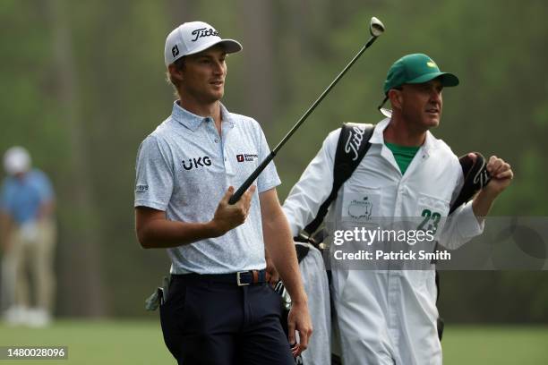 Will Zalatoris of the United States talks with his caddie Joel Stock on the 11th hole during a practice round prior to the 2023 Masters Tournament at...