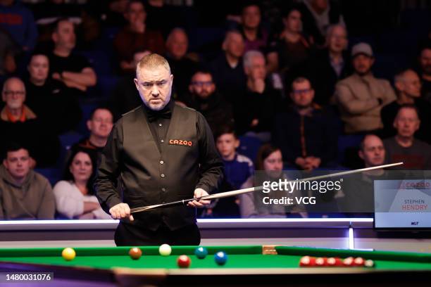 Stephen Hendry of Scotland reacts in the first round match against James Cahill of England during the Cazoo World Championship 2023 Qualifiers at...