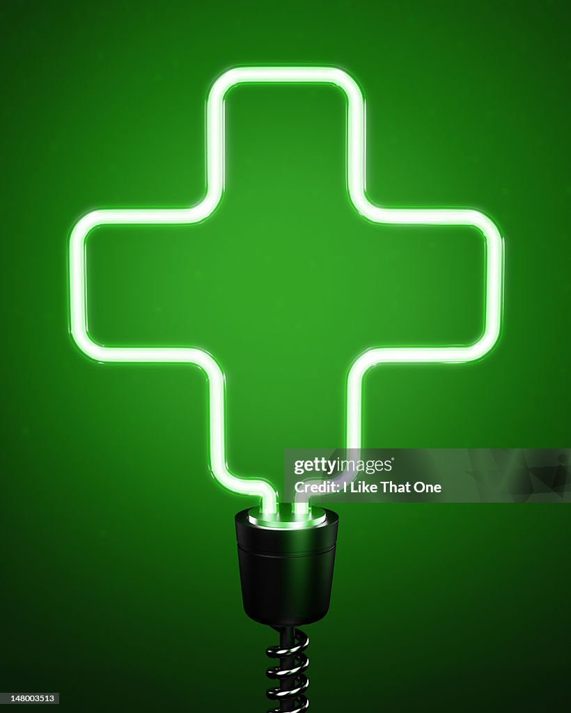 Green, cross shaped energy saving eco lightbulb