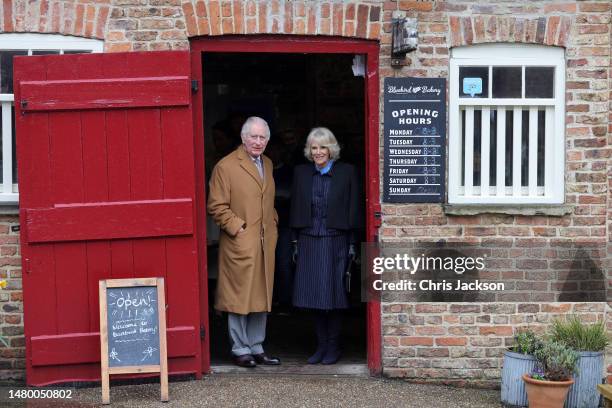 King Charles III and Camilla, Queen Consort visit the Talbot Yard food court on April 05, 2023 in Malton, England. The King and Queen Consort are...