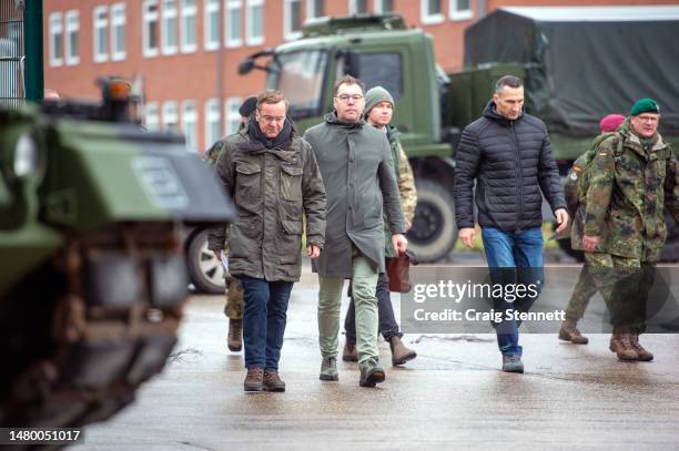 German Defence Minister Boris Pistorius wlks past a Leopard Tank to speak at a Press briefing at the Panzertruppenschule ) in Munster, Lower Saxony,...