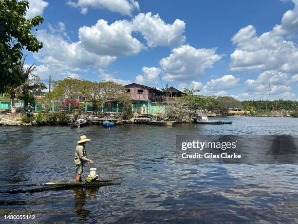 Fisherman on a jetty on March 30, 2023 in Playa Larga, Cuba.