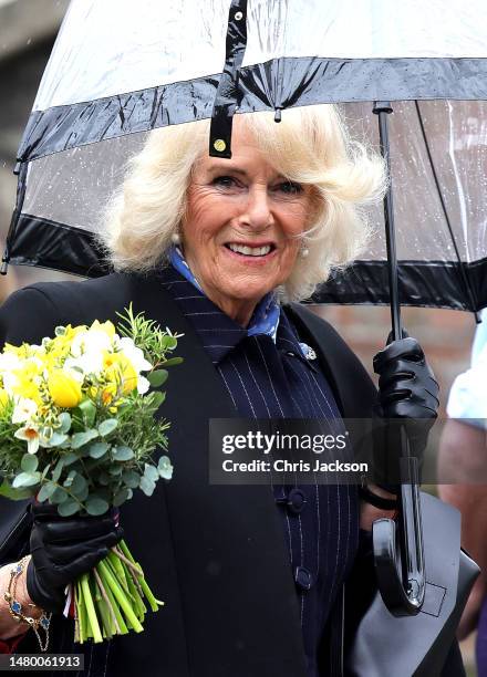 Camilla, Queen Consort smiles as she visits Talbot Yard Food Court on April 05, 2023 in Malton, England. The King and Queen Consort are visiting...