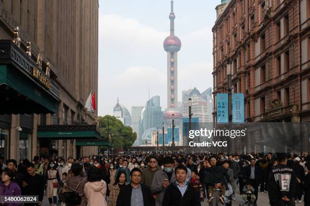 Tourists visit the Nanjing Road during Qingming Festival, or Tomb-Sweeping Day on April 5, 2023 in Shanghai, China.