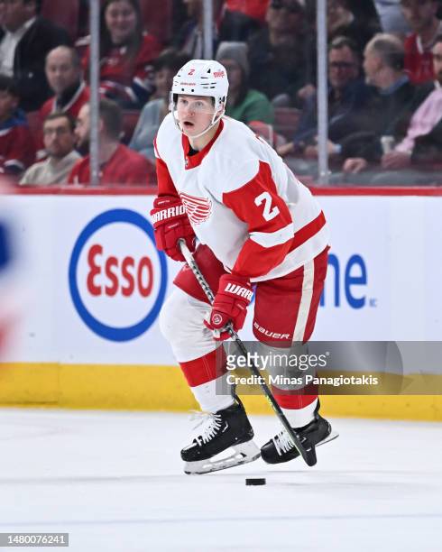 Olli Maatta of the Detroit Red Wings skates the puck during the first period against the Montreal Canadiens at Centre Bell on April 4, 2023 in...