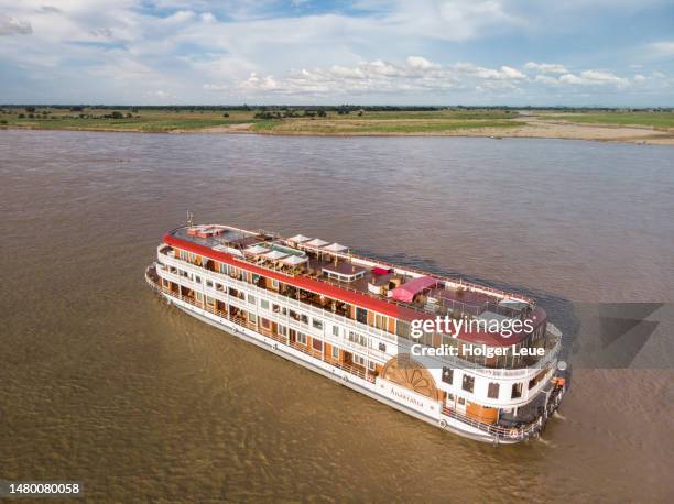 aerial of river cruise ship anawrahta (heritage line) on chindwin river - chindwin stock pictures, royalty-free photos & images