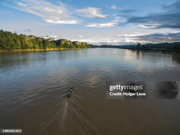 aerial of longtail boat on chindwin river - chindwin stock pictures, royalty-free photos & images