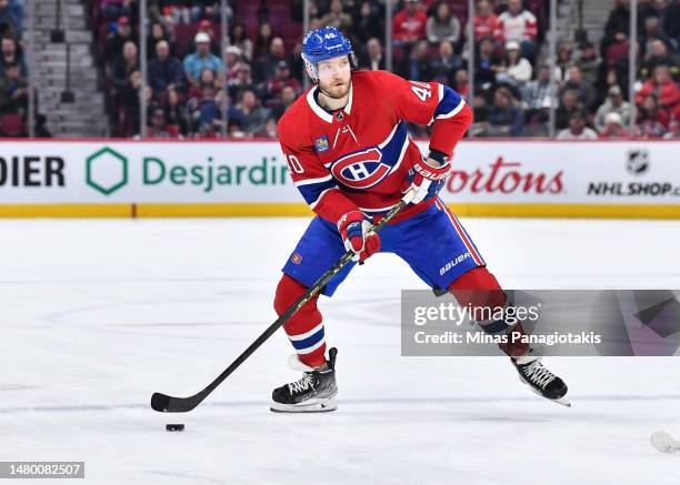 Joel Armia of the Montreal Canadiens skates the puck during the second period against the Detroit Red Wings at Centre Bell on April 4, 2023 in...