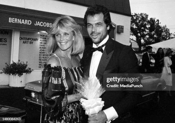 Linda Evans and George Santo Pietro at the party for Larry Thompson in California on August 14, 1982.