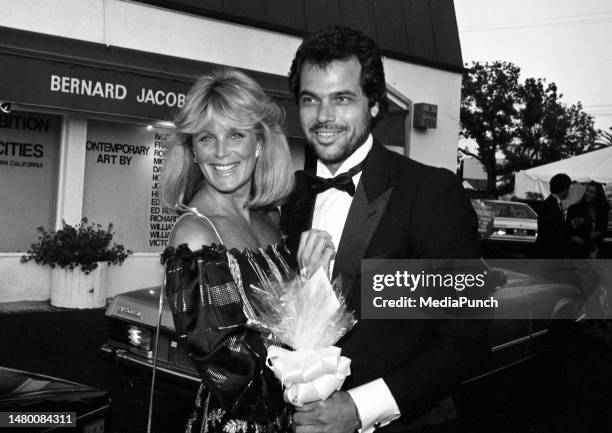 Linda Evans and George Santo Pietro at the party for Larry Thompson in California on August 14, 1982.