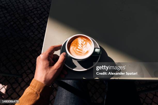 latte art - enjoying coffee cafe morning light stock pictures, royalty-free photos & images