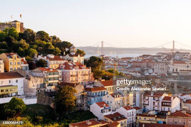 lisbon cityscape at sunset, portugal - baixa stock pictures, royalty-free photos & images