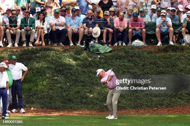 Mark O'Meara of the United States plays a shot on the ninth hole during the Par 3 contest prior to the 2023 Masters Tournament at Augusta National...