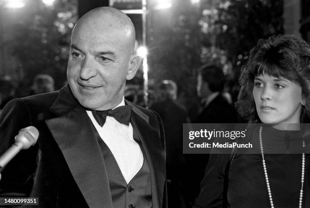 Telly Savalas and Julie Hovland at the 1982 AFI Lifetime Achievement Award honoring Frank Capra at The Beverly Hilton Hotel in Beverly Hills,...