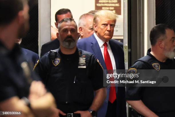 Former President Donald Trump arrives for an arraignment hearing at NYS Supreme Court on April 04, 2023 in New York City. Former President Trump will...