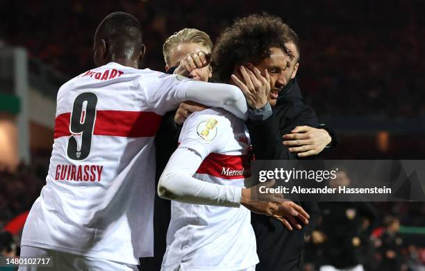 Enzo Millot of VfB Stuttgart celebrates with teammates after scoring the team's first goal during the DFB Cup Quarterfinal match between 1. FC...