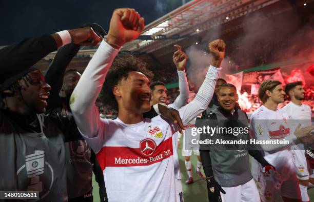 Enzo Millot of VfB Stuttgart celebrates with teammates after the team's victory in the DFB Cup Quarterfinal match between 1. FC Nürnberg and VfB...