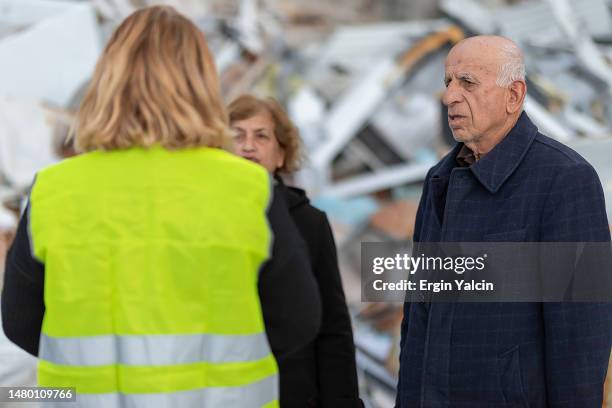 senior couple whose house was destroyed in the earthquake calls for search and rescue service - emergency first response stock pictures, royalty-free photos & images