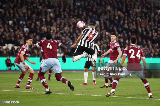 Callum Wilson of Newcastle United scores the team's first goal during the Premier League match between West Ham United and Newcastle United at London...