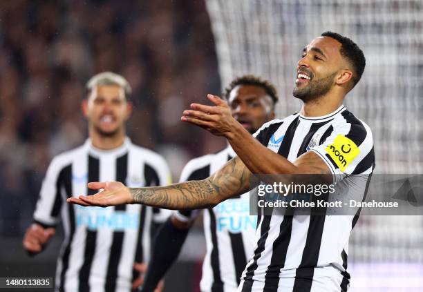 Callum Wilson of Newcastle United celebrates scoring their teams first goal during the Premier League match between West Ham United and Newcastle...