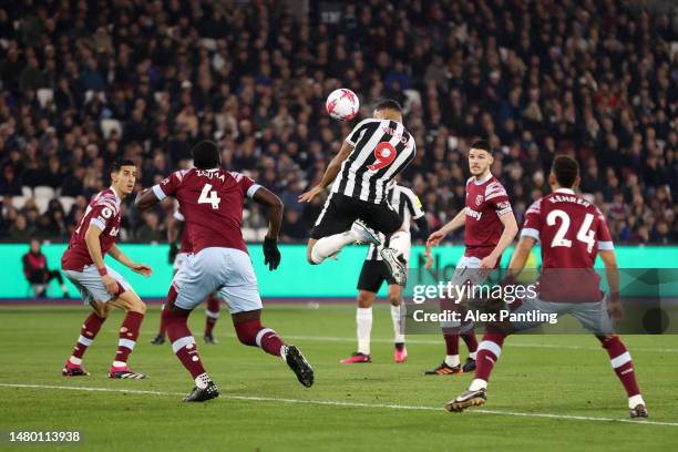 Callum Wilson of Newcastle United scores the team's first goal during the Premier League match between West Ham United and Newcastle United at London...