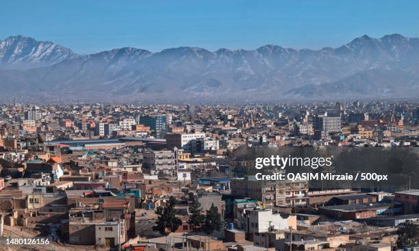 high angle view of townscape against sky,kabul,afghanistan - afghanistan foto e immagini stock