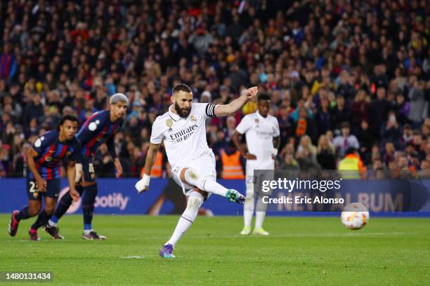 Karim Benzema of Real Madrid scores the team's third goal from a penalty kick during the Copa Del Rey Semi Final Second Leg match between FC...