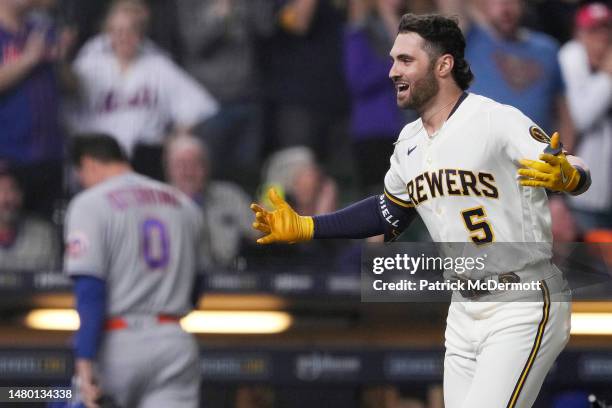 Garrett Mitchell of the Milwaukee Brewers celebrates after hitting a walk-off solo home run against the New York Mets in the ninth inning at American...