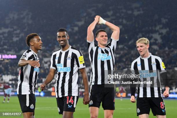 Alexander Isak of Newcastle United celebrates alongside teammates after scoring the team's fourth goal during the Premier League match between West...
