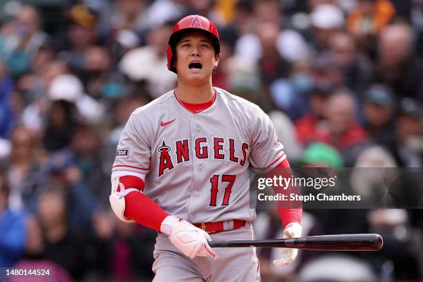 Shohei Ohtani of the Los Angeles Angels reacts to a strike during the third inning against the Seattle Mariners at T-Mobile Park on April 05, 2023 in...