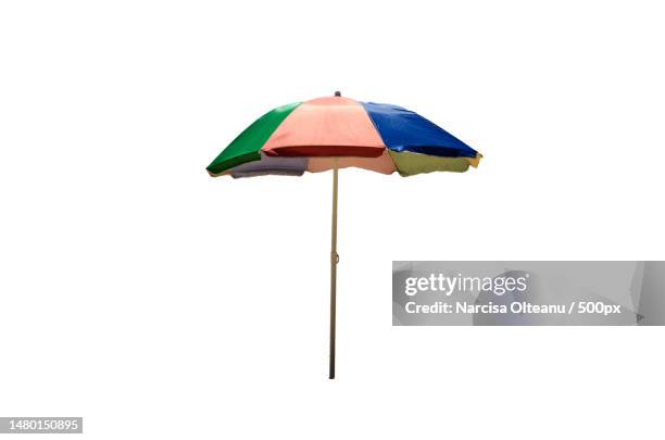 close-up of umbrella against white background,romania - beach umbrella stock pictures, royalty-free photos & images