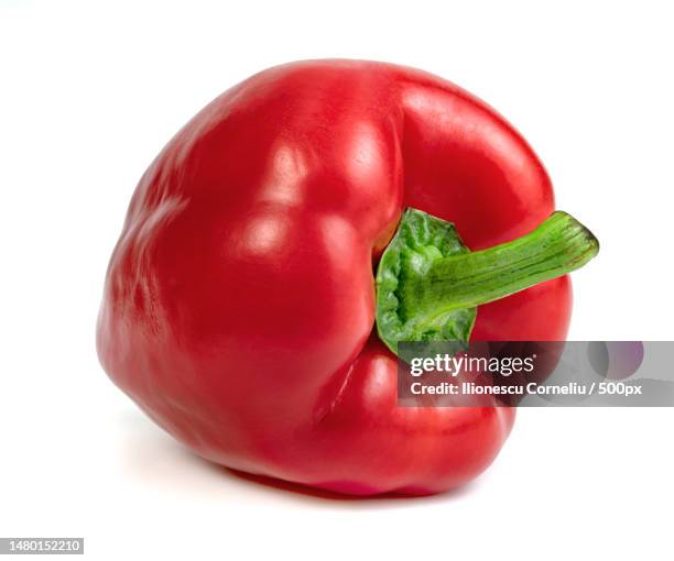 red sweet bell pepper sliced isolated on white background,craiova,romania - paprika scharfe schoten stock-fotos und bilder