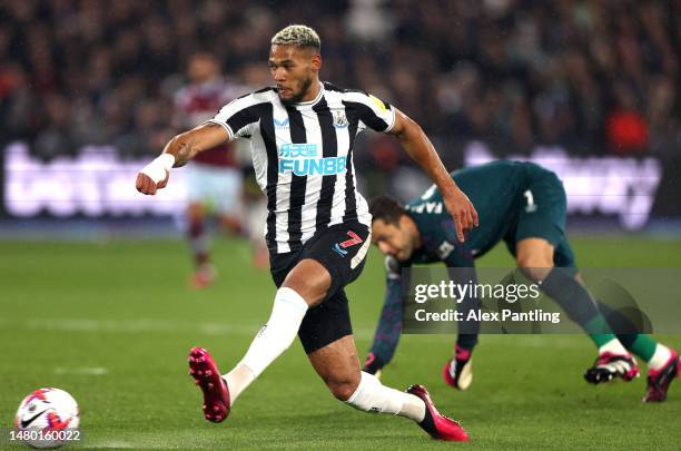 Joelinton of Newcastle United scores his sides second goal during the Premier League match between West Ham United and Newcastle United at London...