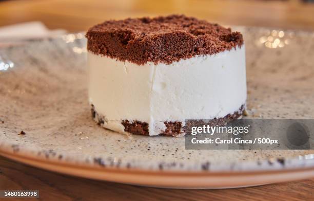 close-up of cake in plate on table,romania - tom hale imagens e fotografias de stock