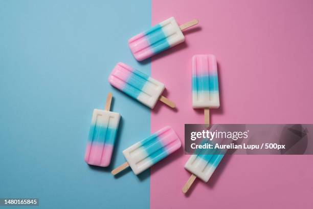 directly above shot of colorful spools over colored background,romania - sorbet isolated stock pictures, royalty-free photos & images