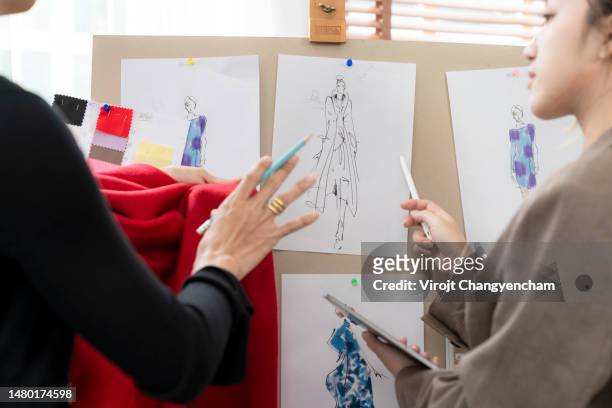 young asian fashion designer at work, small business owner concept. - atelier stock pictures, royalty-free photos & images