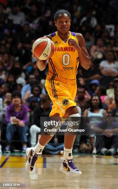 Alana Beard of the Los Angeles Sparks brings the ball up the court during the game against the Seattle Storm at Staples Center on July 7, 2012 in Los...