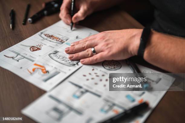 caucasian male draws a storyboard - branding identity stock pictures, royalty-free photos & images