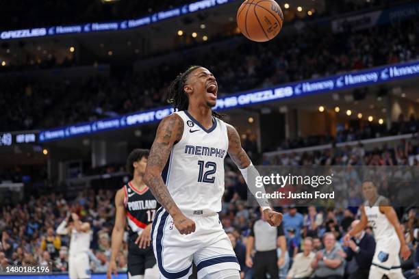 Ja Morant of the Memphis Grizzlies reacts during the game against the Portland Trail Blazers at FedExForum on April 04, 2023 in Memphis, Tennessee....