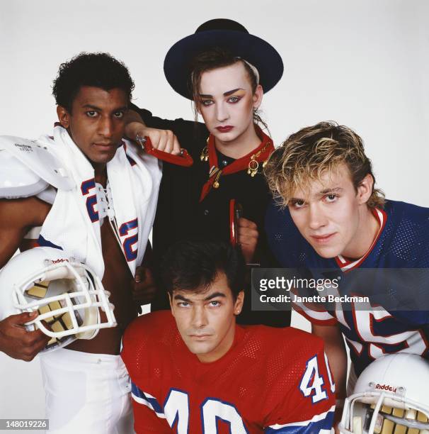 Portrait of the members of the British pop group Culture Club as they pose against a white background, New York, New York, 1983. Pictured are, from...