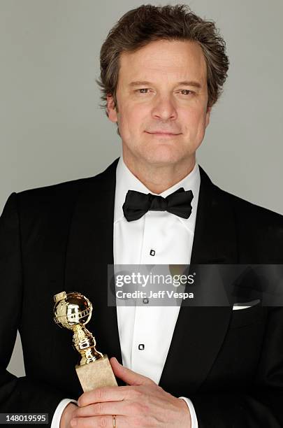 Actor Colin Firth poses with his award for Best Performance by an Actor in a Motion Picture - Drama backstage at the 68th Annual Golden Globe Awards...