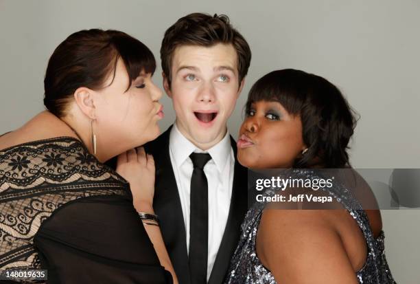 Actors Chris Colfer, Ashley Fink, and Amber Riley pose for a portrait backstage at the 68th Annual Golden Globe Awards held at The Beverly Hilton...