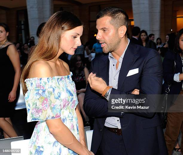 Olivia Palermo and Alexandre Birman attend Fashion's Night Out: The Show at Lincoln Center on September 7, 2010 in New York City.