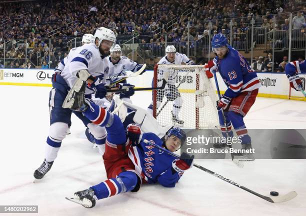 Nikita Kucherov of the Tampa Bay Lightning takes a third period penalty for tripping Kaapo Kakko of the New York Rangers at Madison Square Garden on...