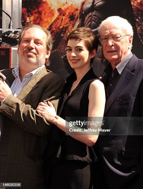 Composer Hans Zimmer, Anne Hathaway and Michael Caine attend Christopher Nolan hand and footprint ceremony at Grauman's Chinese Theatre on July 7,...