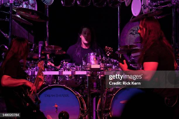 Bassist John Myung, Mike Mangini, and John Petrucci of Dream Theater perform at ACL Live on July 7, 2012 in Austin, Texas.