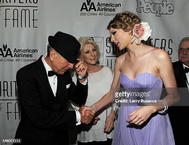 Leonard Cohen, Judy Collins and Taylor Swift meet at the 41st Annual Songwriters Hall of Fame Ceremony at The New York Marriott Marquis on June 17,...