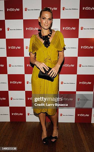 Model/actress Molly Sims attends a dinner hosted by InStyle editor Ariel Foxman celebrating her InStyle cover and new role as Save the Children...