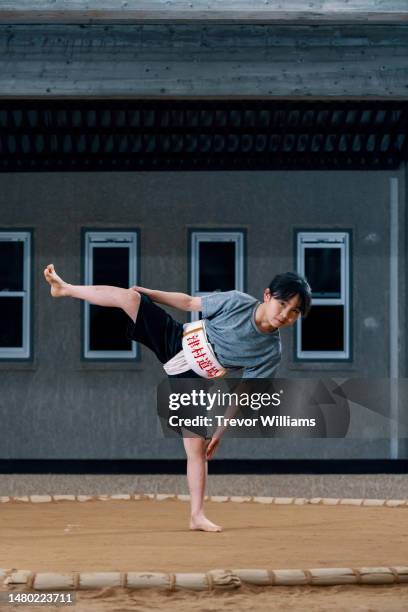 portrait of a young elementary-aged female sumo wrestler - female wrestling stock pictures, royalty-free photos & images